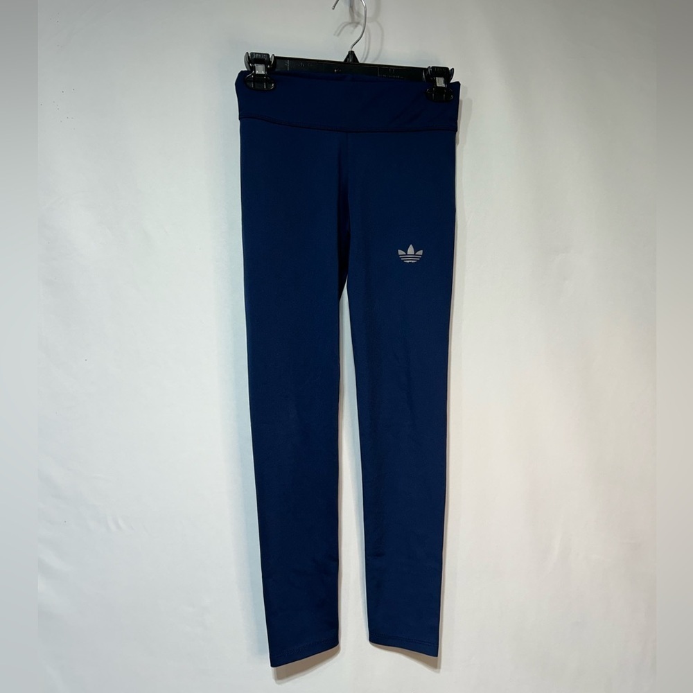 Adidas woman’s navy blue leggings. New condition. Size small. Reflective logo.